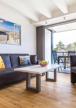 Ferienwohnung Dünenheide 3.4 - Wohnzimmer Ansicht 1